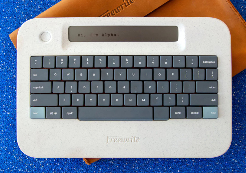 a flat keyboard with a thin, dim old style LCD display